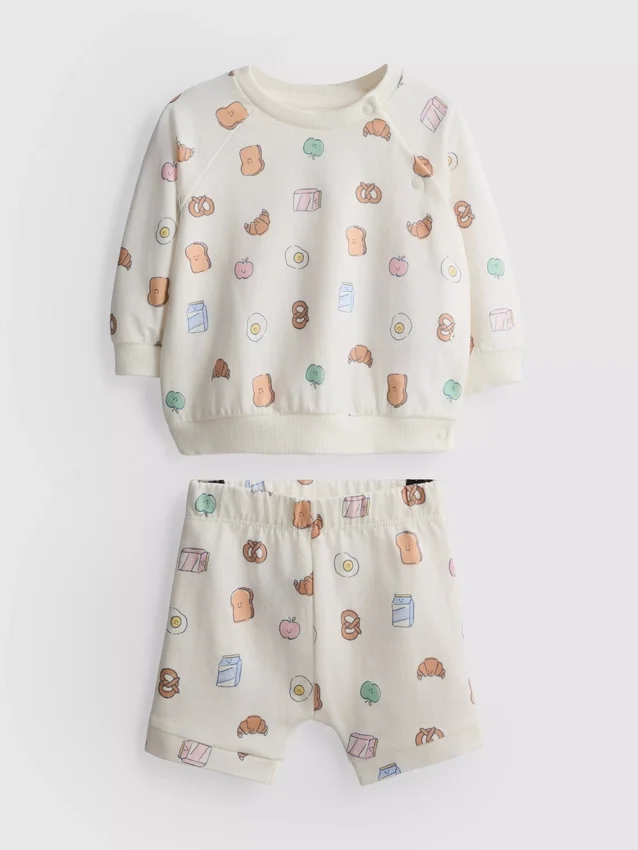 0-18 luni | Set compus din pulover cu imprimeu cu alimente și pantaloni scurți 0-18 luni | Set compus din pulover cu imprimeu cu alimente și pantaloni scurți