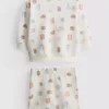0-18 luni | Set compus din pulover cu imprimeu cu alimente și pantaloni scurți 0-18 luni | Set compus din pulover cu imprimeu cu alimente și pantaloni scurți
