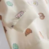 0-18 luni | Set compus din pulover cu imprimeu cu alimente și pantaloni scurți 0-18 luni | Set compus din pulover cu imprimeu cu alimente și pantaloni scurți