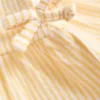 0-36 luni | Set compus din bluză cu tiv peplum brodat cu motive florale și pantaloni scurți