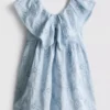 1,5-12 ani | rochie smock brodată cu motive florale „The Edit” 1,5-12 ani | rochie smock brodată cu motive florale „The Edit”