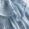 1,5-12 ani | rochie smock brodată cu motive florale „The Edit” 1,5-12 ani | rochie smock brodată cu motive florale „The Edit”