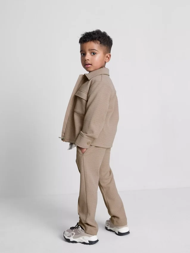 1,5–8 ani | Set compus din jachetă jacquard cu fermoar și pantaloni de trening 1,5–8 ani | Set compus din jachetă jacquard cu fermoar și pantaloni de trening