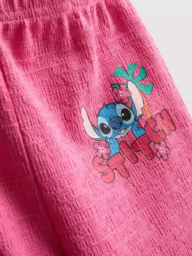 1,5–8 ani | Set de bluză și pantaloni cu model „Stitch” de la Disney 1,5–8 ani | Set de bluză și pantaloni cu model „Stitch” de la Disney