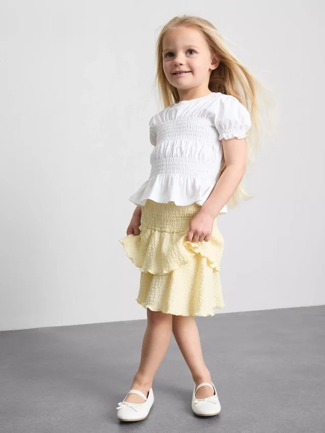 1,5–9 ani | bluză cu peplum plisat 1,5–9 ani | bluză cu peplum plisat