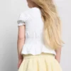 1,5–9 ani | bluză cu peplum plisat 1,5–9 ani | bluză cu peplum plisat