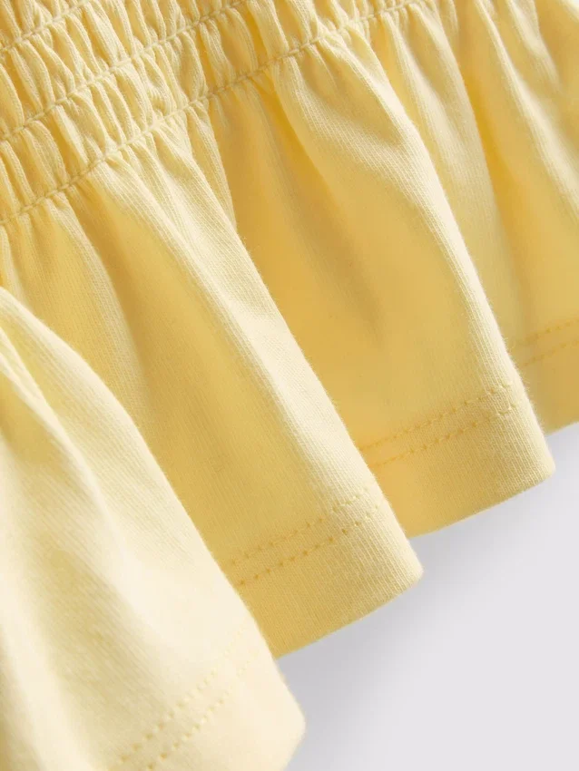 1,5–9 ani | bluză cu peplum plisat 1,5–9 ani | bluză cu peplum plisat