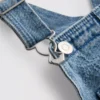 1,5–9 ani | salopetă din denim cu fundiță 1,5–9 ani | salopetă din denim cu fundiță