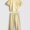 1,5–9 ani | Set compus din tricou cu volane și pantaloni