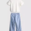 1,5–9 ani | Set compus din tricou cu volane și pantaloni
