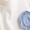 1,5–9 ani | Set compus din tricou cu volane și pantaloni