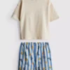 1-9 ani | Set de cămăși cu imprimeu grafic și Pantaloni Scurți Dolce Vita 1-9 ani | Set de cămăși cu imprimeu grafic și Pantaloni Scurți Dolce Vita