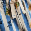 1-9 ani | Set de cămăși cu imprimeu grafic și Pantaloni Scurți Dolce Vita 1-9 ani | Set de cămăși cu imprimeu grafic și Pantaloni Scurți Dolce Vita
