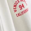 7-15 ani | Pantaloni de Trening cu croi evazat și imprimeu „Venice City” 7-15 ani | Pantaloni de Trening cu croi evazat și imprimeu „Venice City”