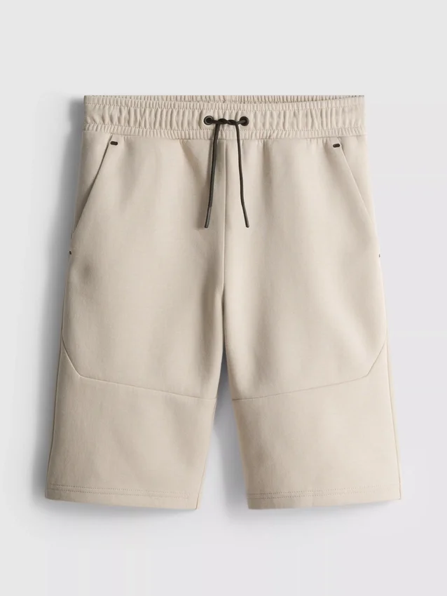 7-15 ani | Pantaloni Scurți cu material laminat 7-15 ani | Pantaloni Scurți cu material laminat