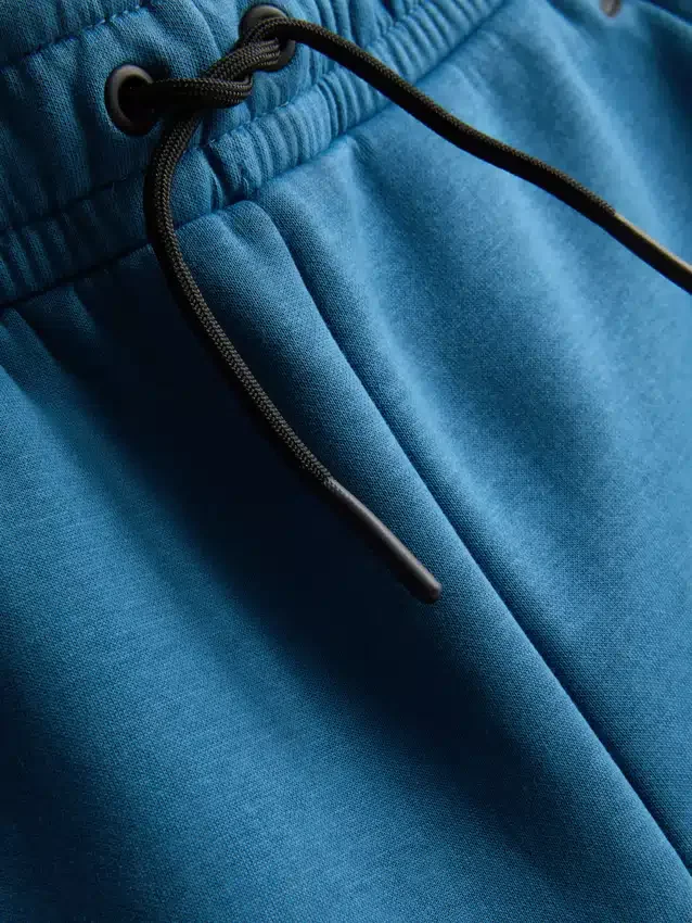 7-15 ani | Pantaloni Scurți cu material laminat 7-15 ani | Pantaloni Scurți cu material laminat