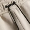 7-15 ani | Pantaloni Scurți cu material laminat 7-15 ani | Pantaloni Scurți cu material laminat