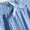 7-15 ani | Pantaloni Scurți cu volane și efect de șifonare 7-15 ani | Pantaloni Scurți cu volane și efect de șifonare