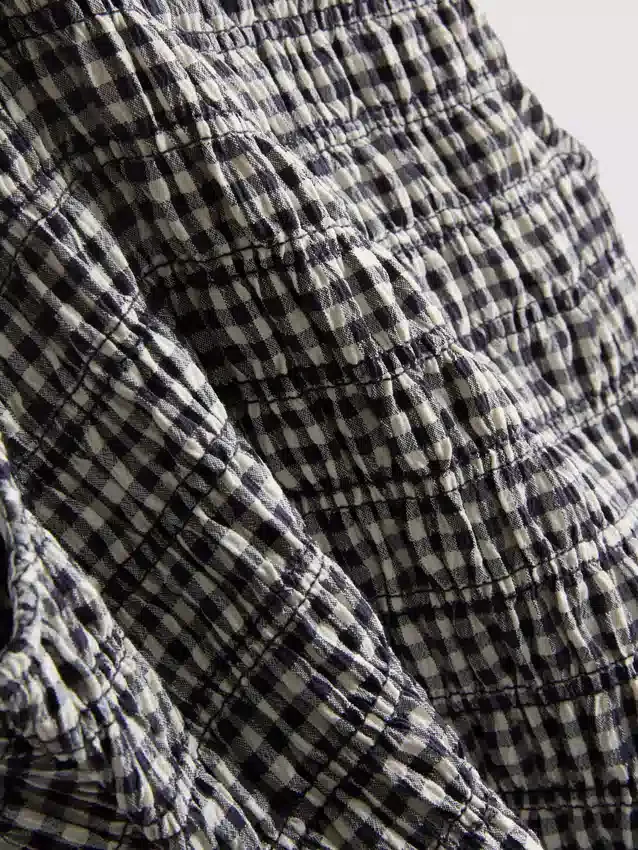 7-15 ani | rochie fără mâneci din bumbac cu imprimeu gingham și volane 7-15 ani | rochie fără mâneci din bumbac cu imprimeu gingham și volane