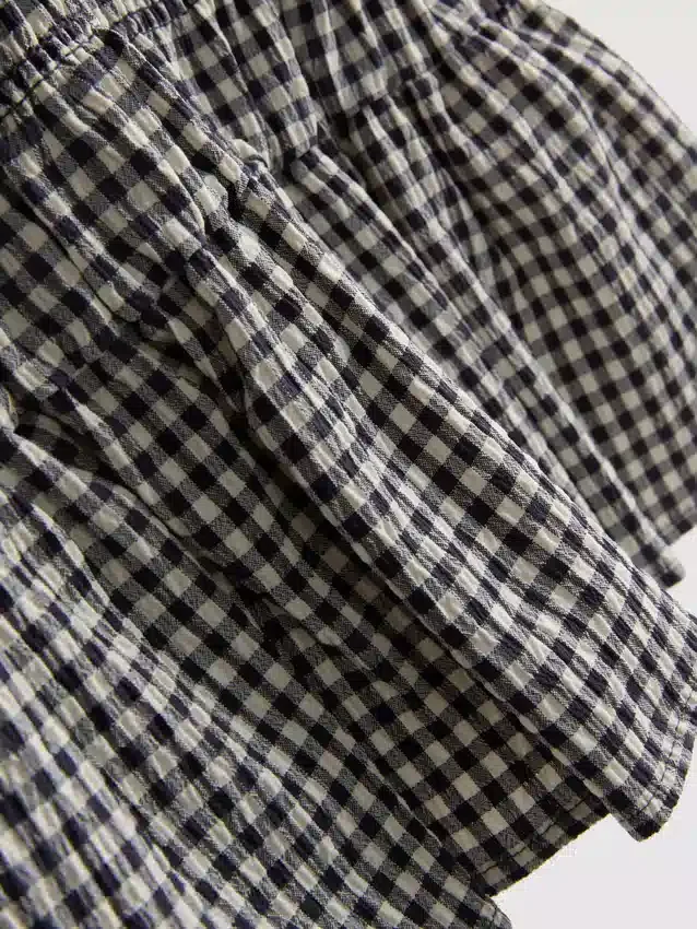 7-15 ani | rochie fără mâneci din bumbac cu imprimeu gingham și volane 7-15 ani | rochie fără mâneci din bumbac cu imprimeu gingham și volane
