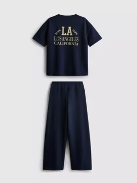 7-15 ani | Set compus din cămășă și pantaloni de trening cu croi larg 7-15 ani | Set compus din cămășă și pantaloni de trening cu croi larg