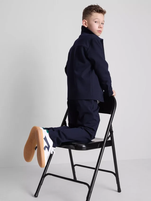 7-15 ani | Set compus din jachetă cu fermoar din jacquard și pantaloni de trening 7-15 ani | Set compus din jachetă cu fermoar din jacquard și pantaloni de trening
