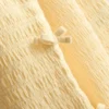 7-15 ani | Set compus din top fără mâneci cu pliuri și pantaloni scurți