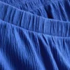 7-15 ani | Set compus din top fără mâneci cu pliuri și pantaloni scurți