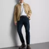 Blugi cu talie medie și croială slim Blugi cu talie medie și croială slim