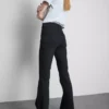 Blugi din denim de bumbac, talie medie, evazați Blugi din denim de bumbac, talie medie, evazați