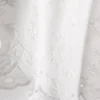 Bluză cu broderie și legături laterale Bluză cu broderie și legături laterale