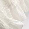 Bluză cu volane la tiv și peplum Bluză cu volane la tiv și peplum