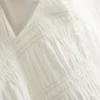 Bluză cu volane la tiv și peplum Bluză cu volane la tiv și peplum