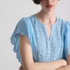 Bluză din bumbac cu mâneci festonate și broderie Bluză din bumbac cu mâneci festonate și broderie