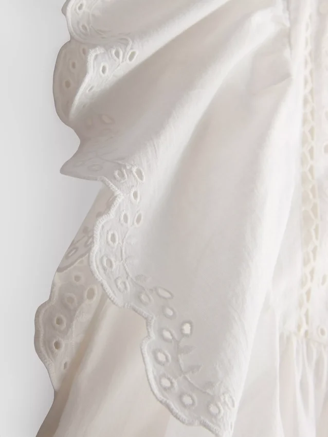 Bluză din bumbac cu mâneci festonate și broderie Bluză din bumbac cu mâneci festonate și broderie