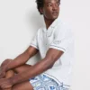Cămășă cu guler reversibil și broderie în formă de pește Cămășă cu guler reversibil și broderie în formă de pește