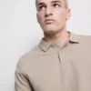 Cămășă polo cu mâneci scurte