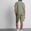 Cămășă polo texturat cu guler cu fermoar Cămășă polo texturat cu guler cu fermoar