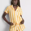 Cămașă de pijama din bumbac cu volane, perfectă pentru relaxare Cămașă de pijama din bumbac cu volane, perfectă pentru relaxare