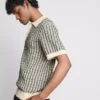 Cămășa polo tricotată în carouri Cămășa polo tricotată în carouri