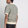 Cămășa polo tricotată în carouri Cămășa polo tricotată în carouri