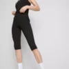 Colanți capri sportivi cu talie înaltă, netede și care oferă susținere Colanți capri sportivi cu talie înaltă, netede și care oferă susținere