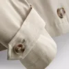 Jachetă de ploaie dreptă, cu două rânduri de nasturi Jachetă de ploaie dreptă, cu două rânduri de nasturi