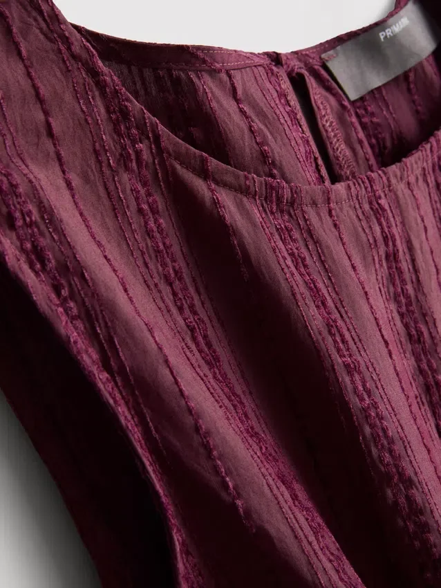 Maiou cu tiv peplum în dungi Maiou cu tiv peplum în dungi