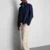 Pantaloni chino largi, cu talie medie Pantaloni chino largi, cu talie medie