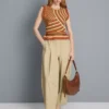 Pantaloni cu croi evazat, plisați, cu aspect de hârtie
