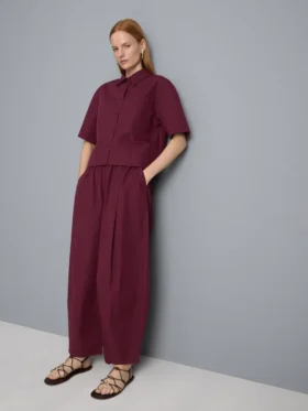 Pantaloni cu croi evazat, plisați, cu aspect de hârtie