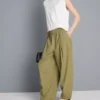 Pantaloni cu croi evazat, plisați, cu aspect de hârtie