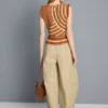 Pantaloni cu croi evazat, plisați, cu aspect de hârtie
