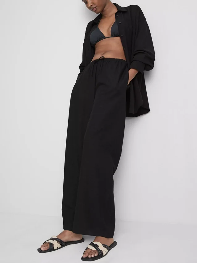 Pantaloni cu croi larg din amestec de bumbac Pantaloni cu croi larg din amestec de bumbac